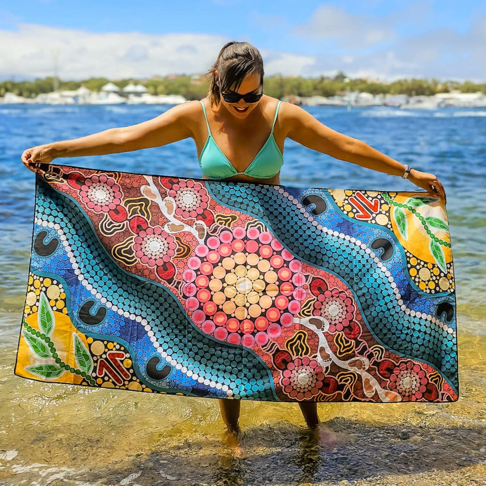 Close-up view of A Breath of Fresh Air Indigenous Travel Towel displaying authentic Aboriginal design with wind patterns, breath symbols, and traditional cultural motifs that honor the sacred life force and spiritual connection to the natural world