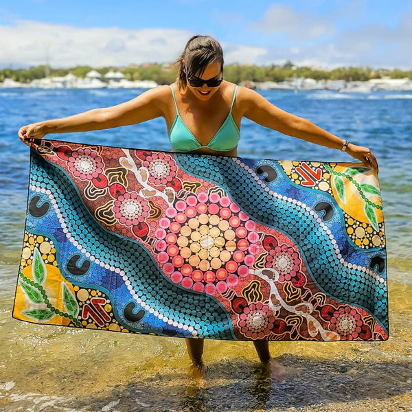 Close-up view of A Breath of Fresh Air Indigenous Travel Towel displaying authentic Aboriginal design with wind patterns, breath symbols, and traditional cultural motifs that honor the sacred life force and spiritual connection to the natural world
