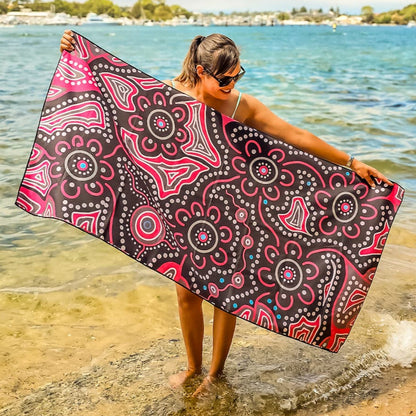 Full view of Frangipani Indigenous Travel Towel displaying authentic Aboriginal design with traditional frangipani motifs, floral symbols, and cultural patterns that honor the sacred beauty and spiritual significance of native flowering plants
