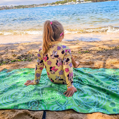 Close-up detail of Starfish Kids Indigenous design showcasing traditional Aboriginal dot painting techniques with starfish motifs in green tones, ocean symbols, and cultural patterns that teach children about marine life and connection to coastal country
