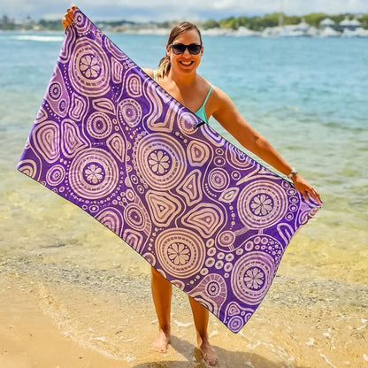 Full view of Walkabout Indigenous Travel Towel displaying authentic Aboriginal walkabout design with traditional symbols representing spiritual journey, cultural pathways, and the sacred connection between traveler and country in deep purple tones
